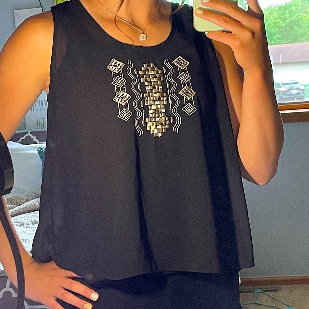 A. Byer tank top, size small, never worn.